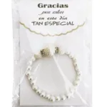 PULSERA BOLAS BLANCAS EN CELOFÁN